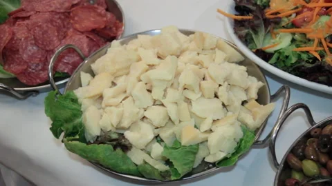 Close-Up Handheld Shot Of Parmesan Cheese over green salad Stock Footage 218218566