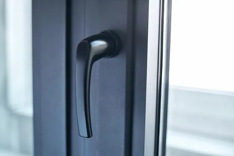 Close-up. handle on the balcony window frame. Photos