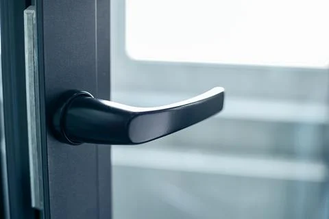 Close-up. handle on the balcony window frame. Photos