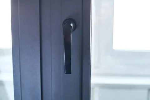 Close-up. handle on the balcony window frame. Photos