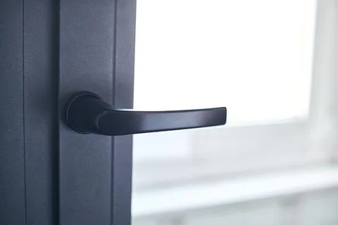 Close-up. handle on the balcony window frame. Photos