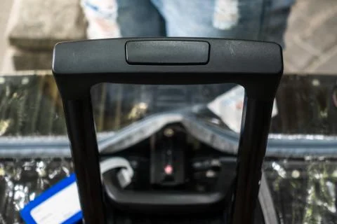 A Close-up of the Handle of a Suitcase Stock Photos