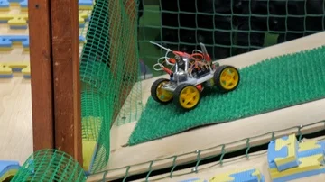 Close-up handmade car construction and electronic components overcome obstacles. Video stock 85717403