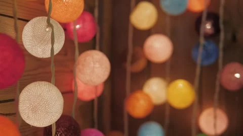 Close-up of handmade Christmas bauble from threads on background bokeh of Stock Footage 305749472