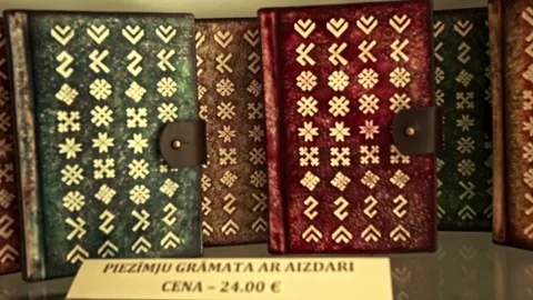 Close-up of handmade leather journals with geometric patterns Stock Footage 332545950