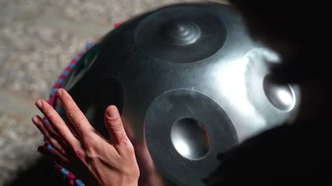 Close up handpan playing behind 24 Haziran 2026 fethiye mugla turkey Stock Footage 341531048