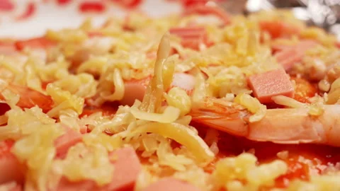 Close up of hands adding healthy ingredients into homemade pizza in kitchen. Stock Footage 158669032