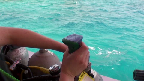 Close-up of hands that adjust scuba tanks, prepare for diving. Stock Footage 233514415
