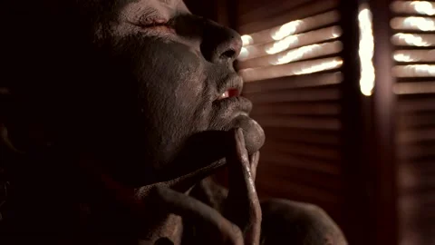 Close-up of hands and faces smeared with clay against the background of wooden Video stock 201141621