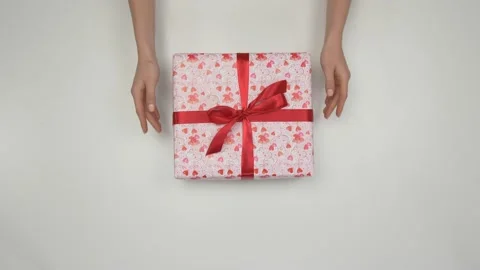 Close-up of the Hands and the Gift. Holidays and Gifts. Stock Footage 176313766