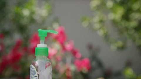 Close-up of hands and hand santizer Stock Footage 127043463