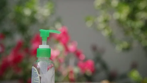 Close-up of hands and hand santizer Stock Footage 127043724