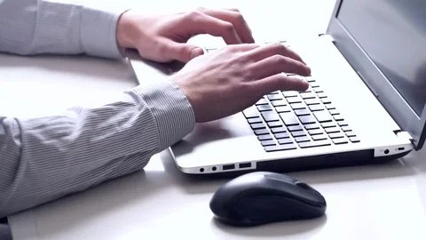 Close-up of hands and keyboard. Clerk working on laptop. Stock Footage 74954376