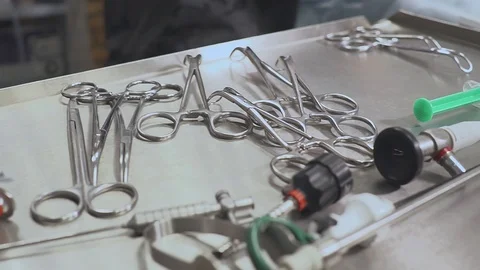 Close up hands and a table of surgical nurse during laparoscopic operation Stock Footage 101676745