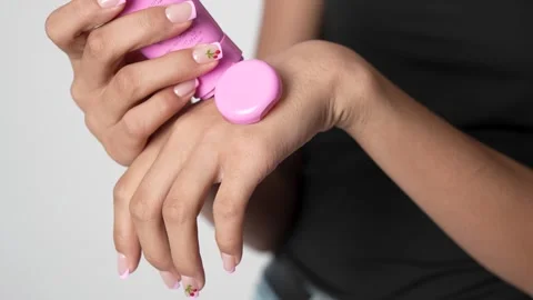 Close-up of hands applying nail polish on fingernails Stock Footage 323165456