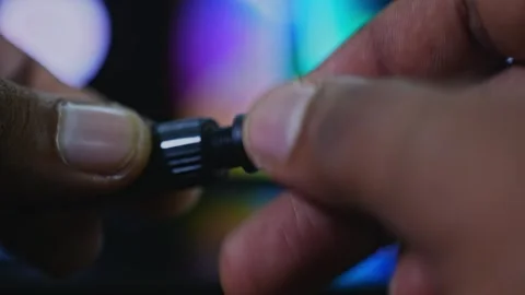 Close Up of Hands Assembling Portable Air Inflator Nozzle Valve stable shot, 4k. Stock Footage 289400504