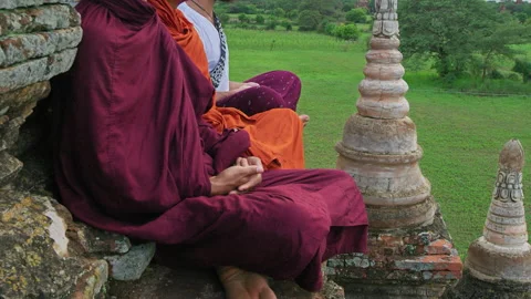 Close up on hands: Authentic real monks In Bagan Mayanmar / Burma doing meditati Stock Footage 201095067