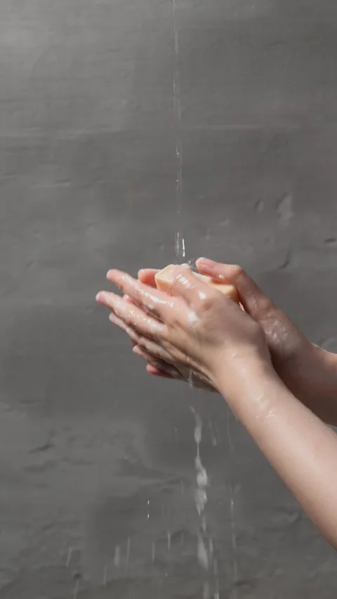 Close-up of hands being washed under running water, promoting health and hy.. Stock Footage 304212974