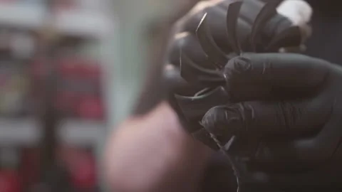 Close hands in black gloves shoot of electronic technic repairer cleaning cooler Stock Footage 154763966