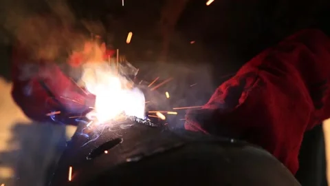 Close-up hands of a builder. A man works with a laser metal cutting machine Stock Footage 131864901