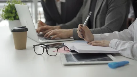Close up hands. Business team work in office and discussing start up ideas and Vidéo 103108785
