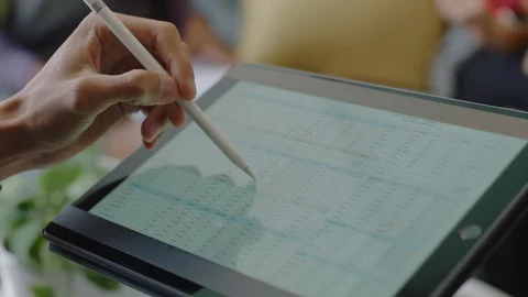 Close up hands businessman using digital tablet computer browsing financial Stock Footage 96889950