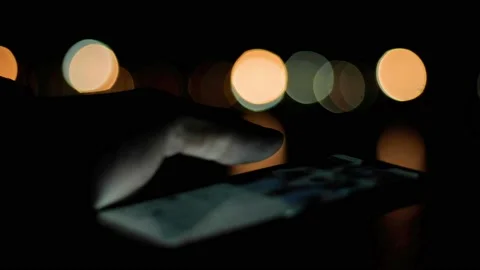 Close Up Of Hands On A Cell Phone At Night In The City Stock Footage