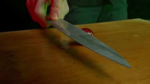 Close up hands of chef cook cutting grape in slow motion in a dark kitchen Video stock 153206641