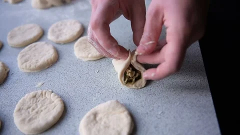 Close-up hands of chef cook dumplings with chicken fillet Stock Footage 130656822