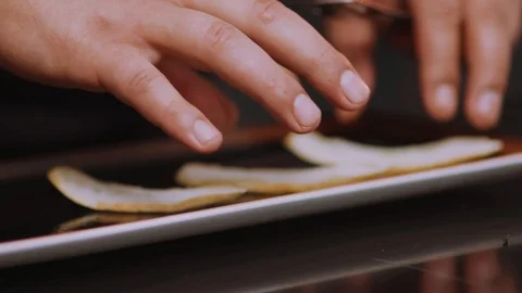 Close up hands chef preparation of the dish puts bread on a plate meat in Stock Footage 100306927