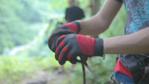 Close-Up Of The Hands Of A Climber Tying A Knot On A Rope 스톡 동영상 126752195
