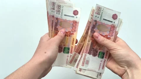 Close-up of hands counting five-thousandth banknotes of the Russian ruble.  Stock Footage 225882068