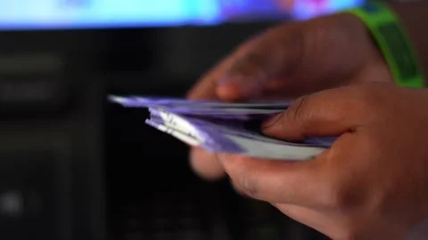 Close-Up of Hands Counting Indian Currency Notes in Low Light Stock Footage 333070002