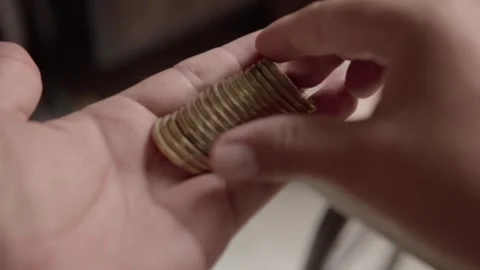 Close up of hands counting Mexican coins during a cash payment or financial Stock Footage 343805583