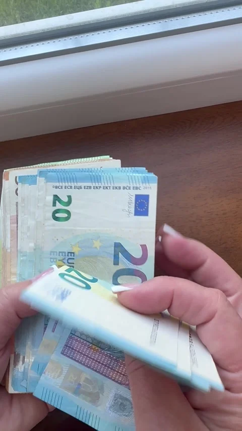 Close Up of Hands Counting Twenty Euro Banknotes, European Cash Currency. Stock Footage 343642767