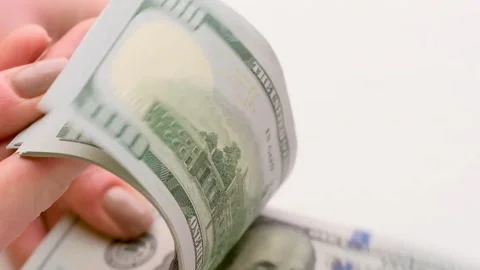 Close-up of Hands Counting US One Hundred Dollar Bills Stock Footage 319983391