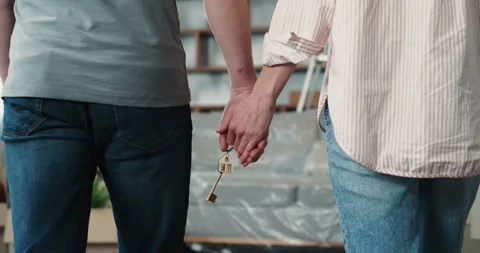Close up Hands of Couple Hands with Keys from the New Apartment Home. Married Stock Footage 172081289