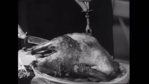 Close-up of hands cutting chicken with knife and carving fork - Closeup of .. Stock-Footage 260256930
