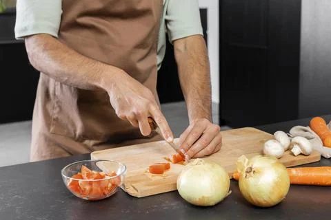 Close up hands cutting tomato Stock Photos