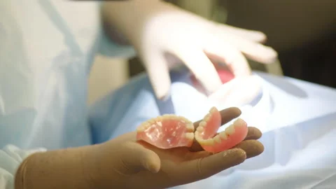 A close-up of the hands of the dental surgeon Stock Footage 236045845
