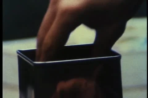 Close-up of hands developing spool of film Stock-Footage 11354860