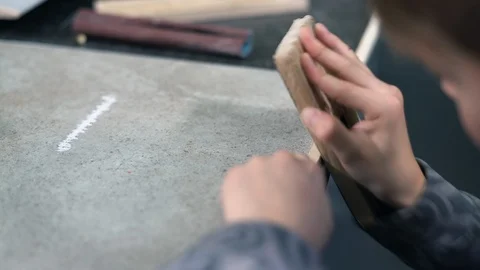 Close-up, Hands of the Disciple Boy Peel the Wooden Detail for the Aircraft Stock Footage 86655522