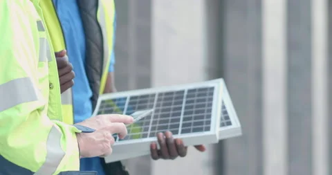 Close up hands diversity engineer discuss with tablet and solar cell Video stock 150613199