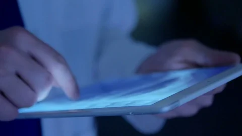 Close-up of hands of a doctor as he views x-ray images Stock-Footage 75134628