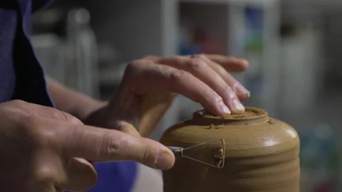 Close up of hands doing pottery with ceramic Stock Footage 232676800
