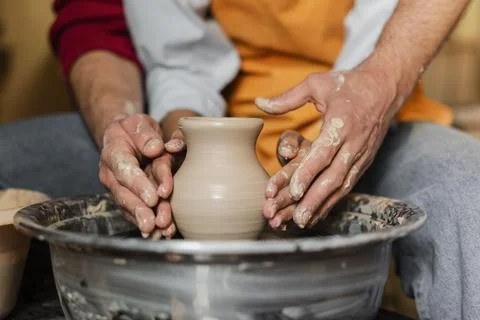 Close up hands doing pottery Stock Photos