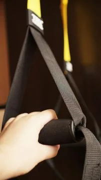 Close up on hands doing suspension training Stock Photos
