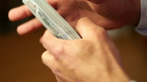 Close up hands during money counting and financial operations. Video stock 336624099