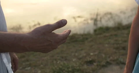 Close-up of the hands of the elderly gently holding hands Stock-Footage 135580705