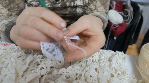 Close up hands of elderly woman, elderly woman knits. Video stock 120790694